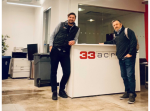 Alexander Ratajczyk and Brian Morris at the 33Across office in New York